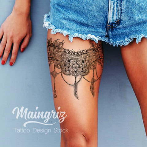 feather and pearl lace garter tattoo design