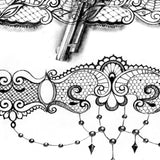 lace garter with gun and rose tattoo design 
