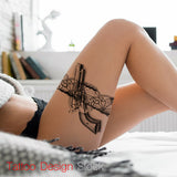 gun with lace garter tattoo design