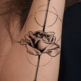 arrow and rose geometric tattoo design