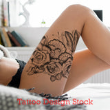 sexy roses butterfly pearls and feathers tattoo design 